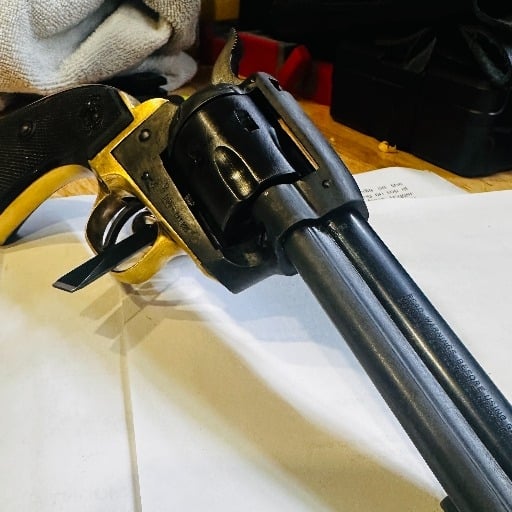 Gun re-bluing or refinishing.